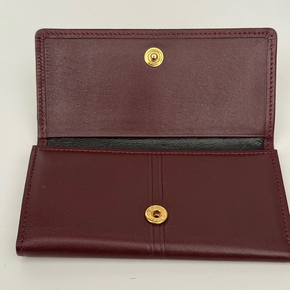 Givenchy 4 Key Holder. Color is of dark red  / brown - Picture 5 of 6